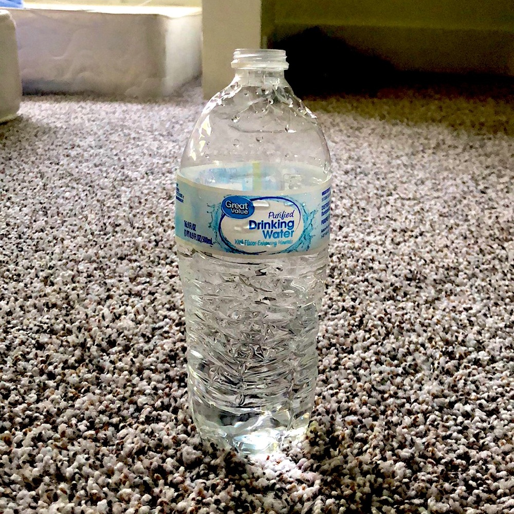 It’s a: used water bottle. Brand: Great Value. No lid
